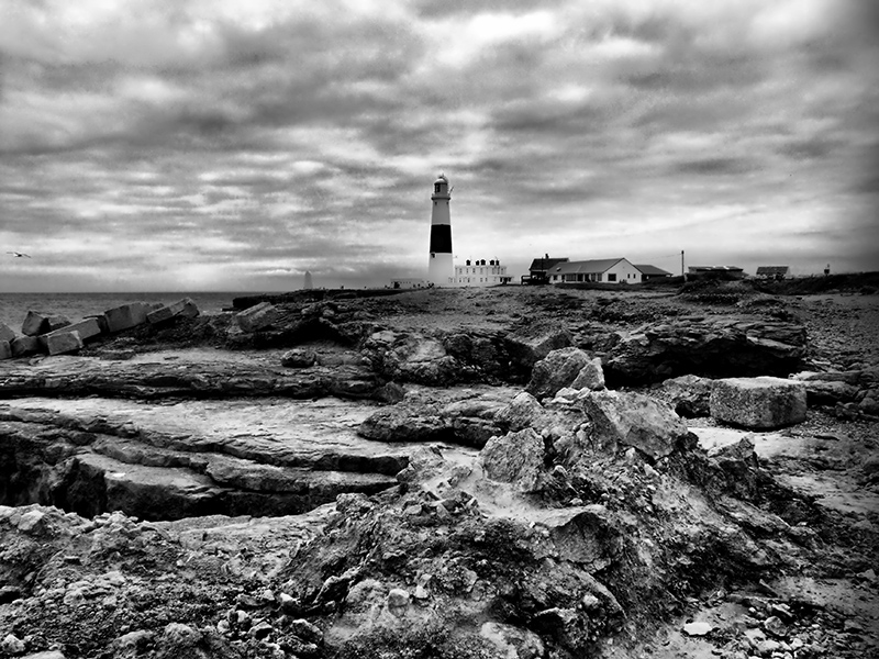 Portland Bill Lighthouse and Rocks in Black and White