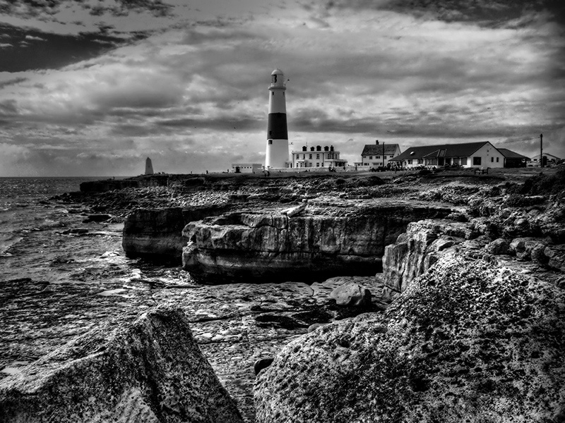 Portland Bill Lighthouse and Rocks in Black and White