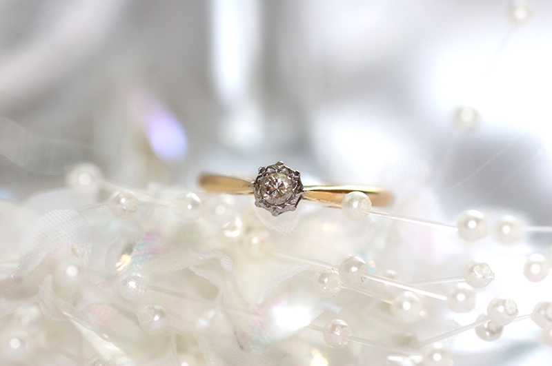 Gold Engagement Ring on White