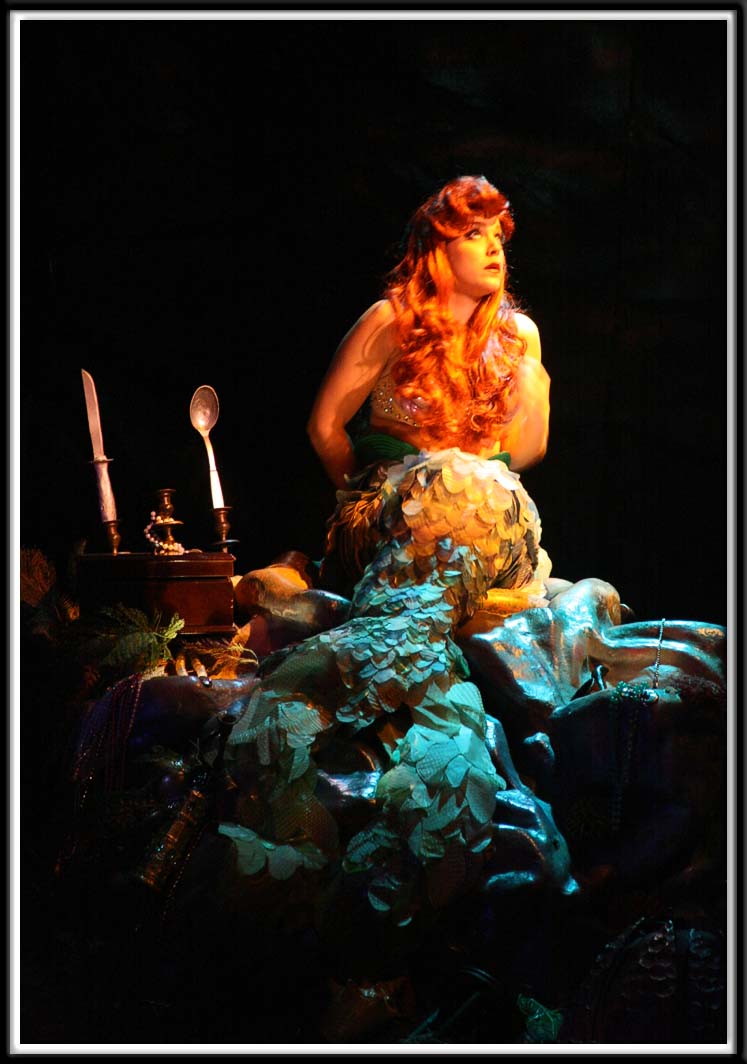 Ariel tries to hide the human fork (Dinglehopper) from King Triton