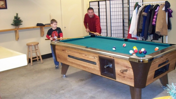 Shane & son playing pool