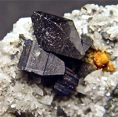 Anatase. Sharp bipyramidal crystals to 12 mm on 45 mm drusy quartz matrix. Dyrafonn, Hardangervidda, Norway.