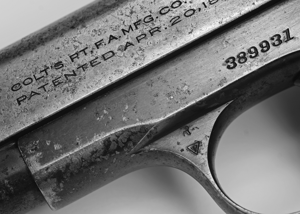 WELL USED COLT MODEL 1903 .32 ACP PISTOL  -  TAKEN WITH A TAMRON SP 90 f/2.5 MACRO LENS