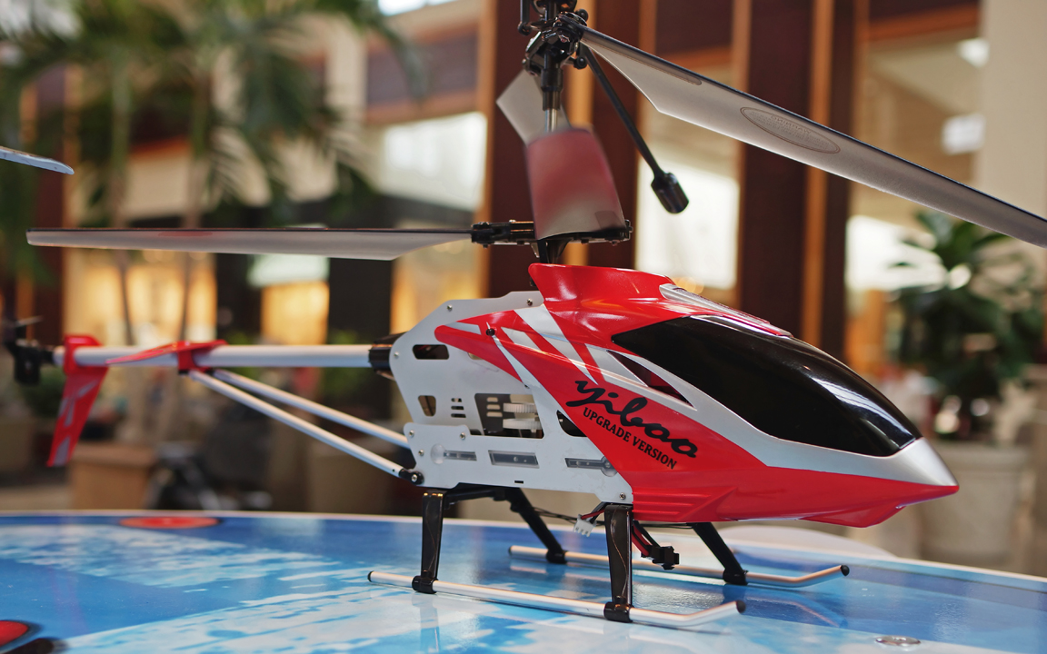 A RADIO COLTROLLED TOY HELICOPTER  -  FOR SALE IN A KIOSK IN THE SOUTH PARK MALL, CHARLOTTE, NORTH CAROLINA