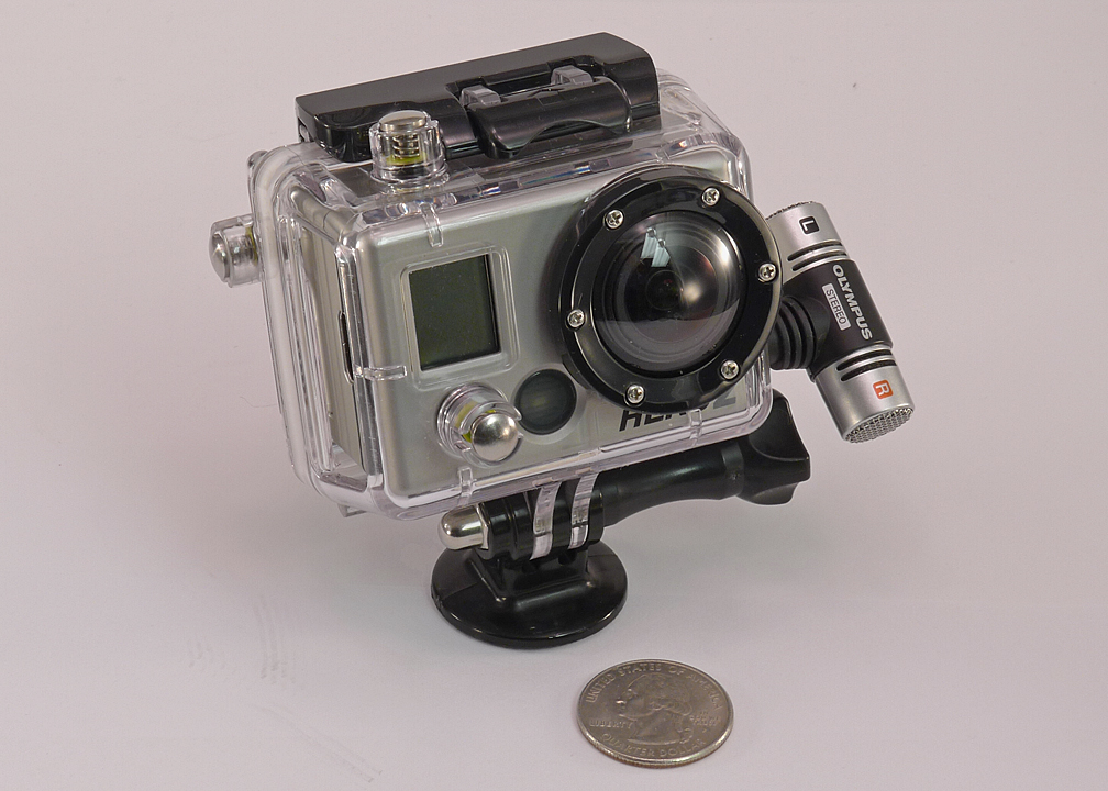 GO-PRO HERO2 (SPORTS EDITION), WITH THE OPTIONAL LCD UNIT  -  INSTALLED  IN THE SKELETON CASE WITH A TRIPOD MOUNT