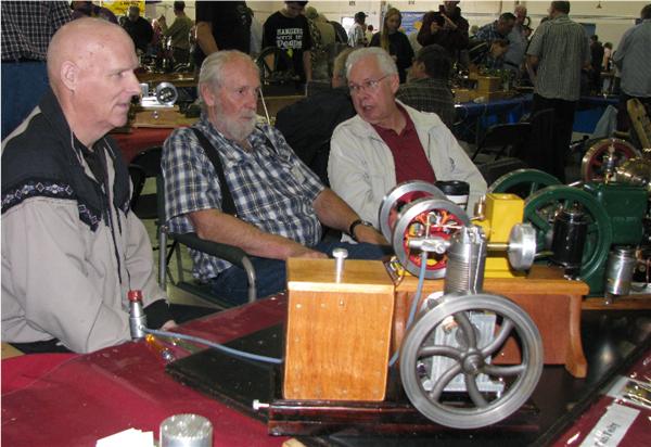 (57)    Carl Felty, Jim and Bill take a little R&R time!