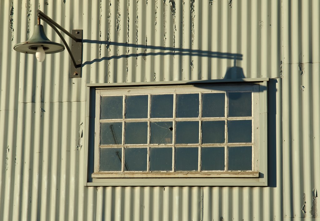 A window with a lamp