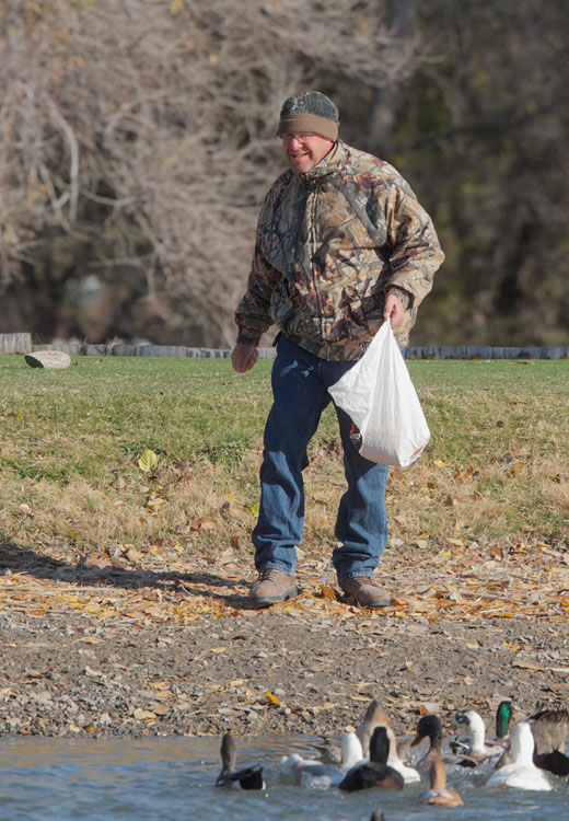 Jim Feeding Ducks