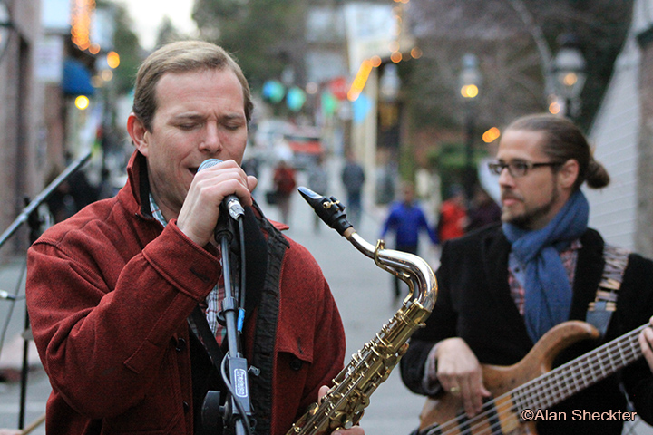 Tyler Matthew Smith performs at the pedal-powered stage on Commercial Street