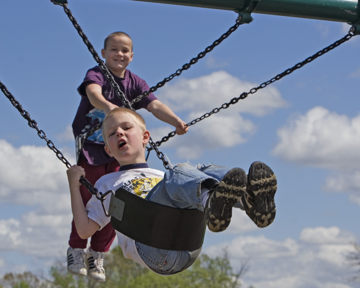 Boys On Swing