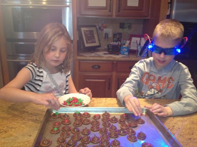 making christmas treats.  it must help to use nightvision goggles!