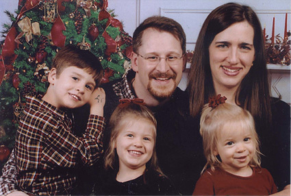 Virginia and her husband Chip Hammond, their children from left to right Nathan, Mary Grace, and Mercy