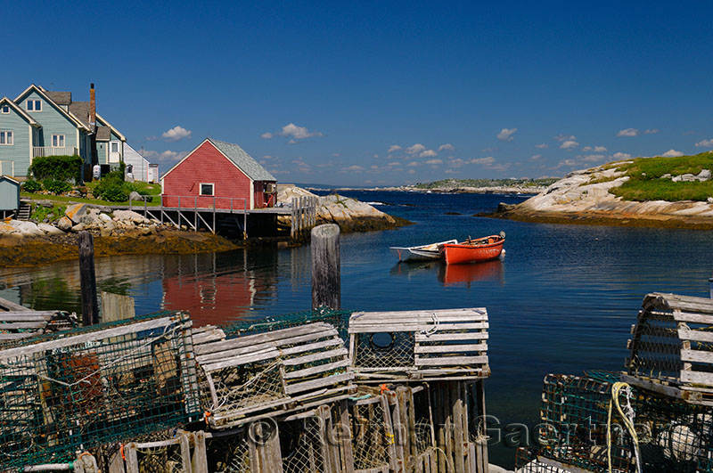 Lobster traps on the wharf in the quiet fishing village of Peggys Cove Nova Scotia
