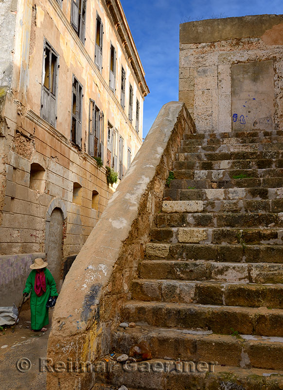 Old woman walking in the medina of the old Portuguese city of El Jadida Morocco