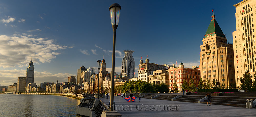 Panorama of early morning looking south on the Bund at Huangpo River Shanghai China