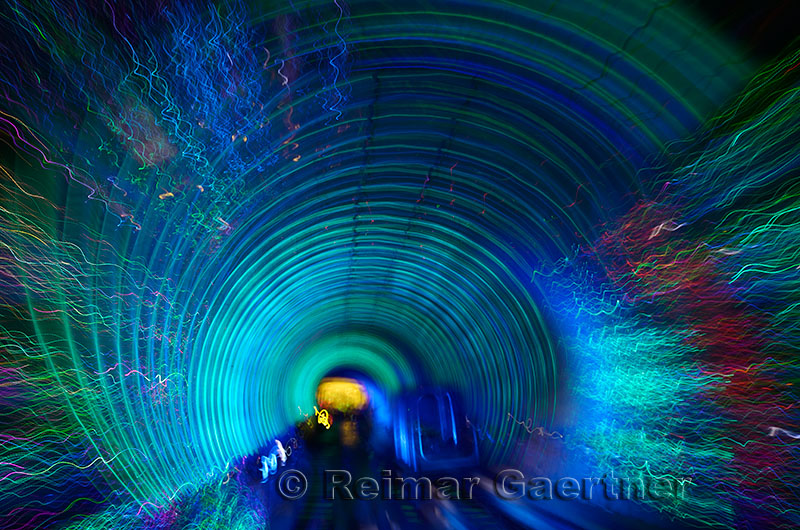 Automated cab car with blue lights in the Bund Sightseeing Tunnel under the Huangpu River Shanghai China