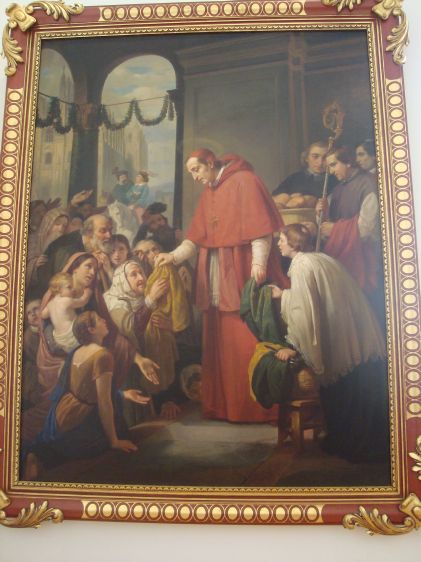 San Carlos Borromeo repartiendo limosna