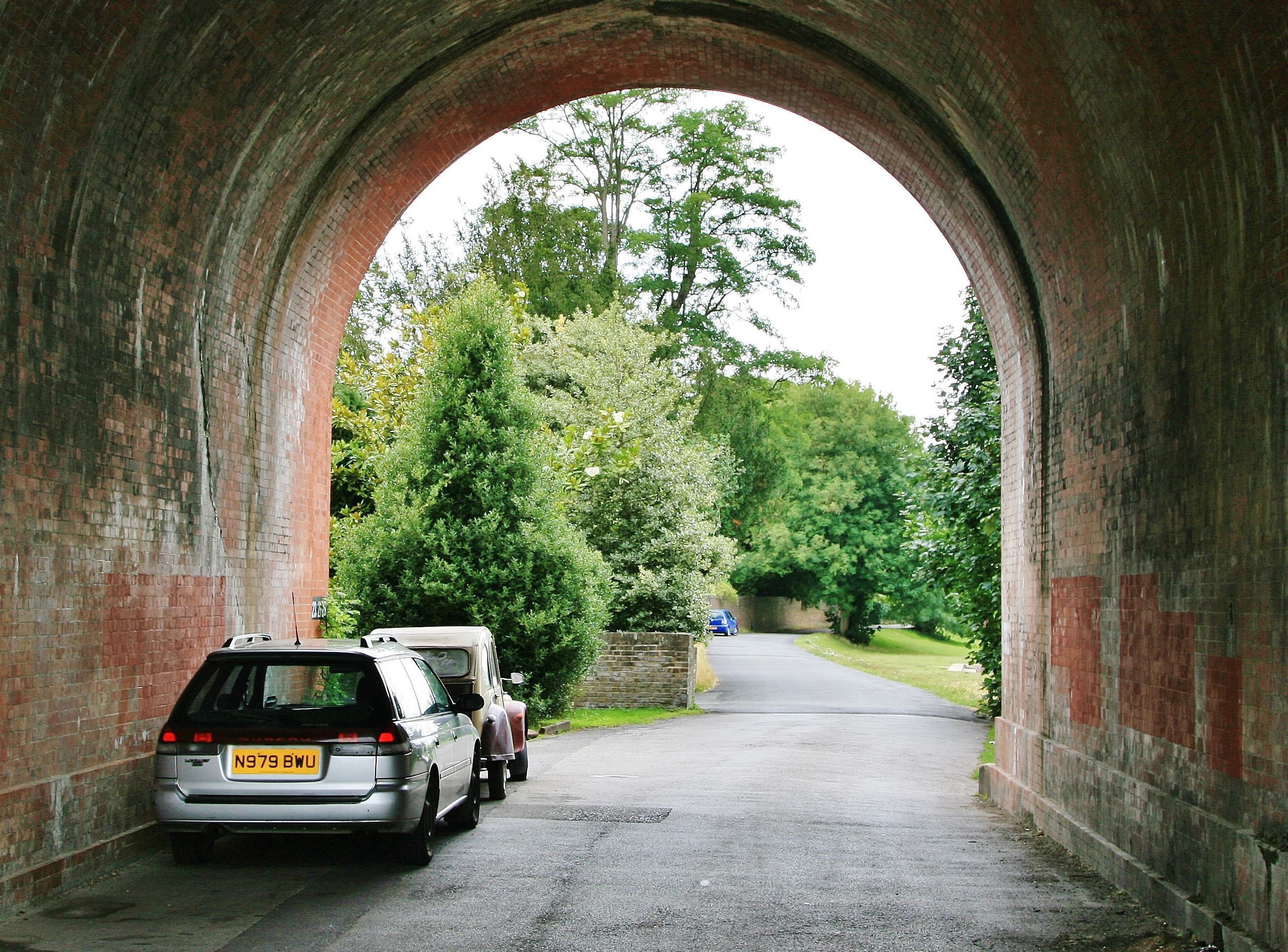 Arch over the road beside the river.