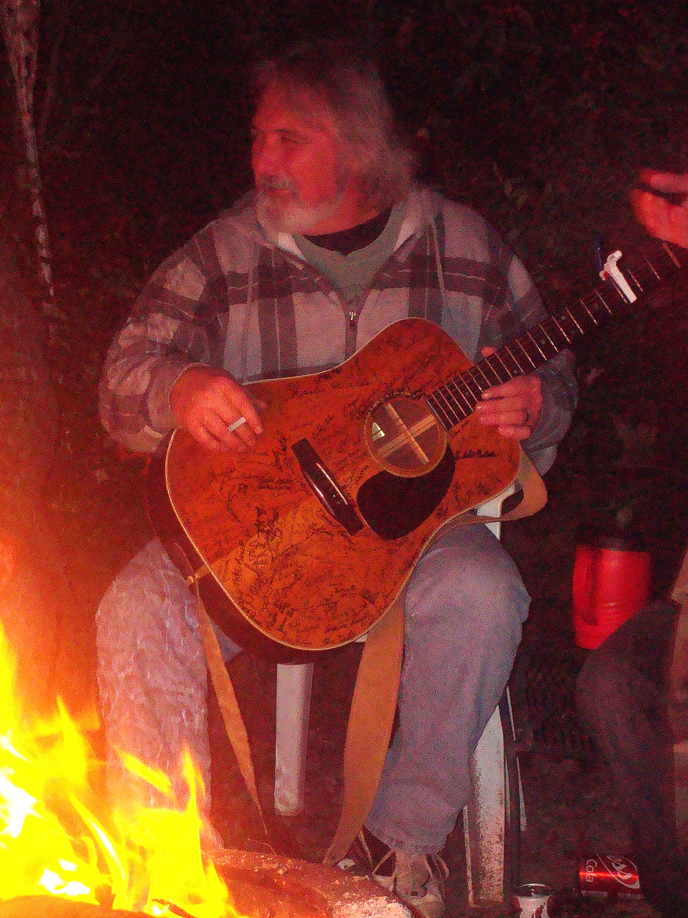 Keith plays by the fire