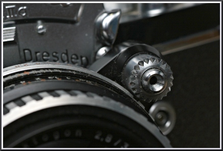 Shutter button with sliding lock