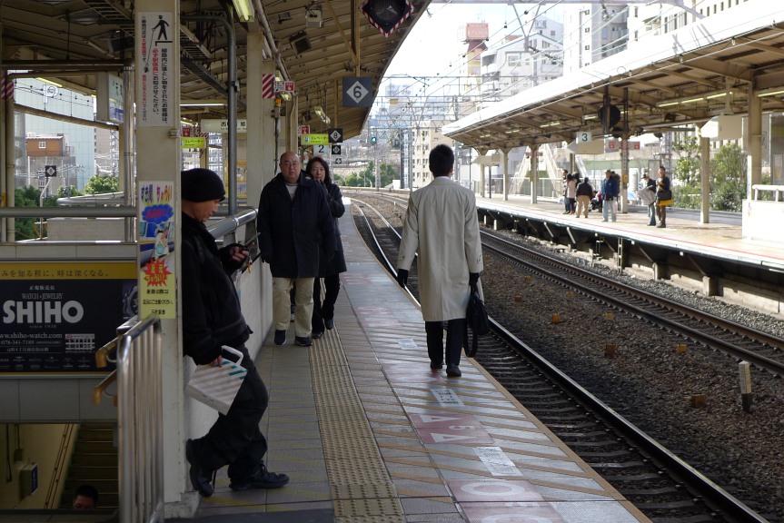 Waiting for train at Motomachi station