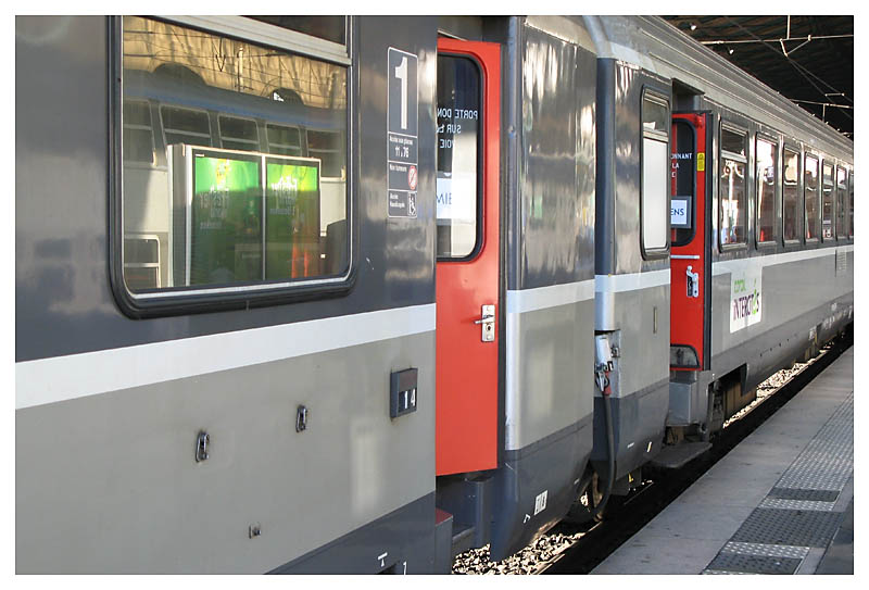 Red Doors and a green Sign