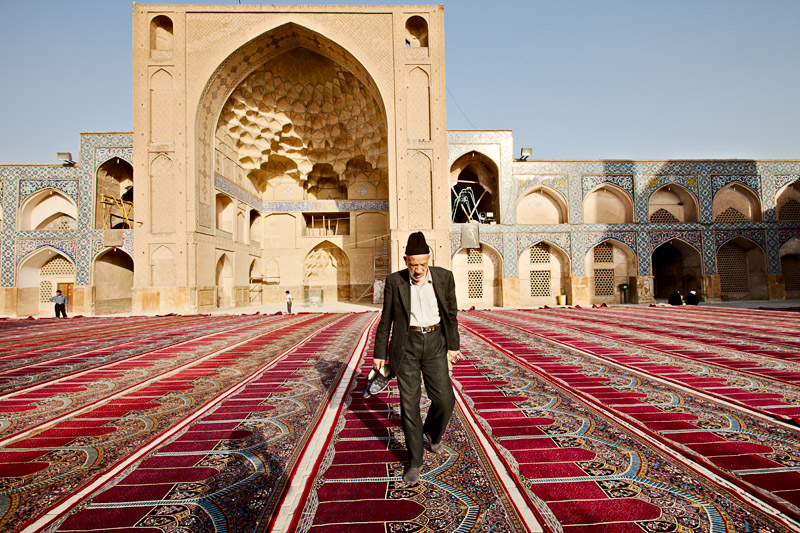 Man walking in Friday Mosque - Esfahan