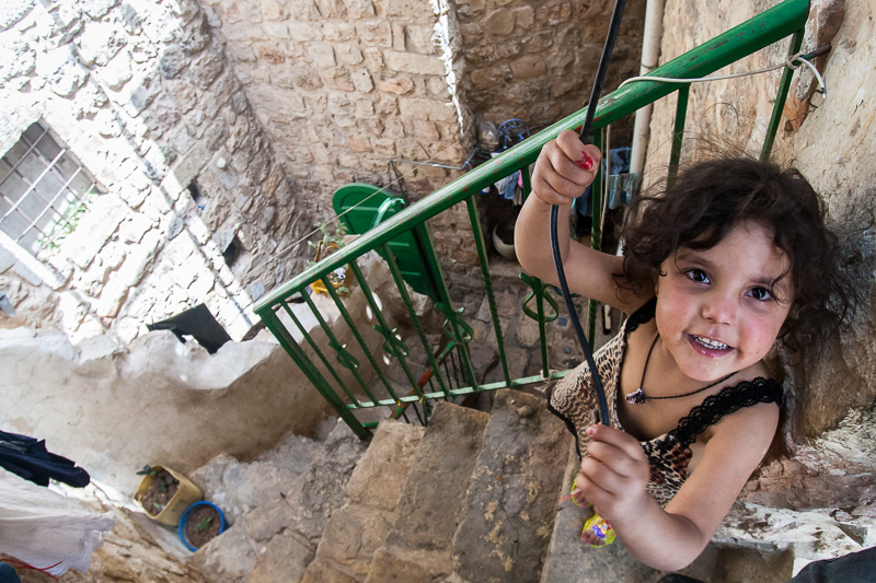 Girl atop stairs - Hebron