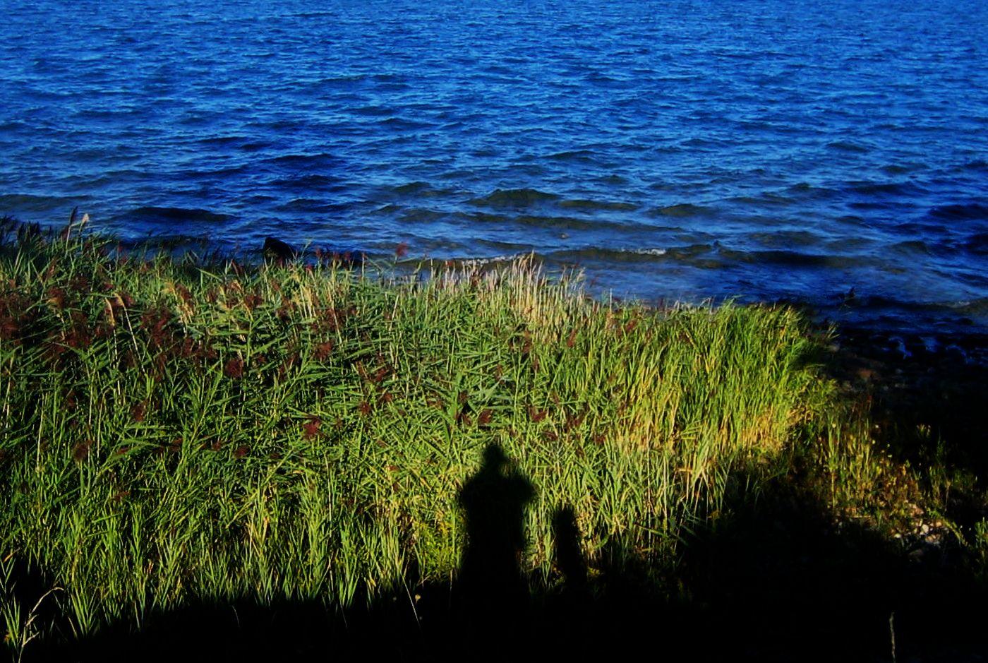standing in his shadow...