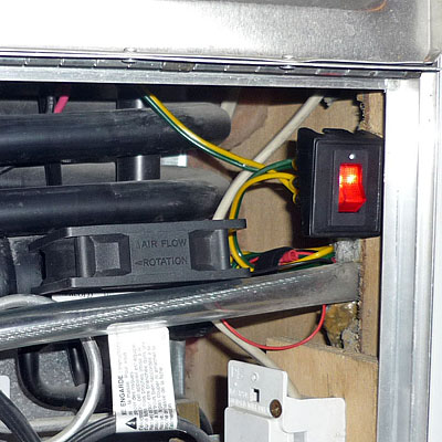 Fan and switch for refrigerator - close-up