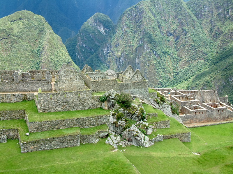 The citadel is set is lush green fields atop a mountain