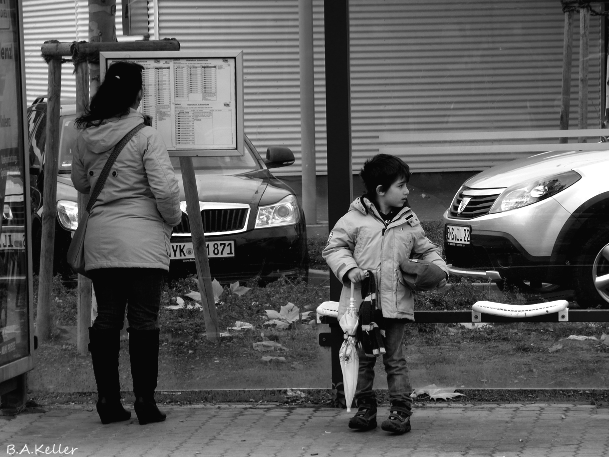 Boy with umbrella..