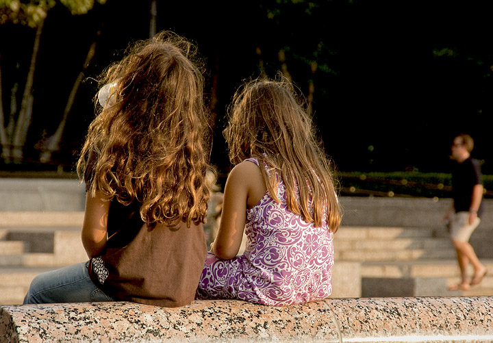 Two Young Heads of Hair and an Adult