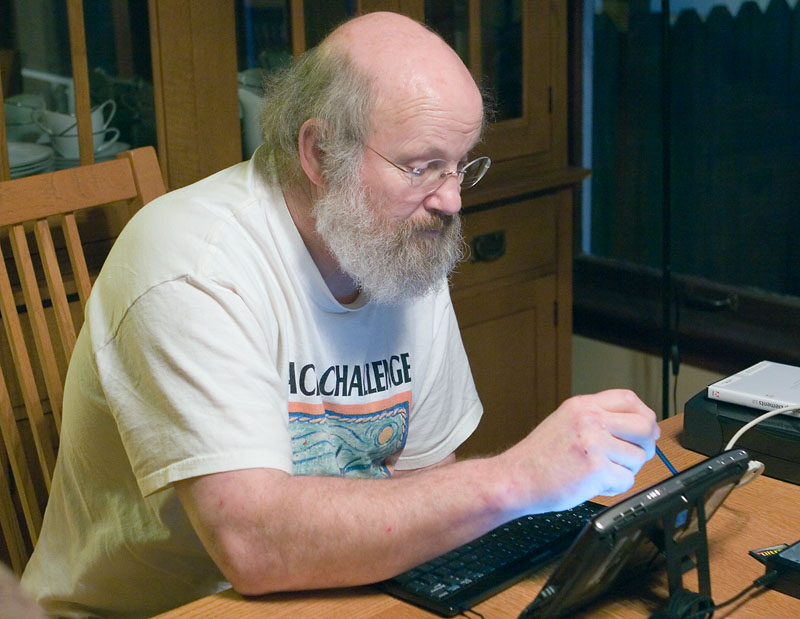 Brother David playing with his new toy - a tablet PC
