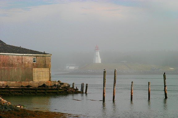 Lighthouse In The Mist  *