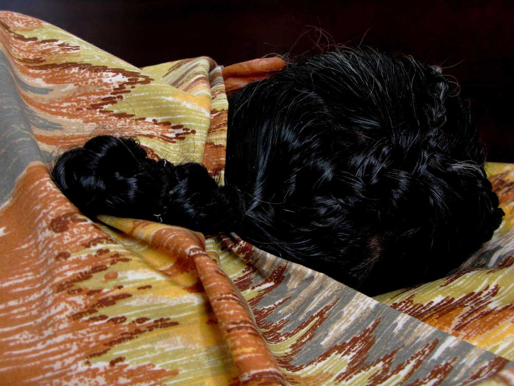 Head upon bed