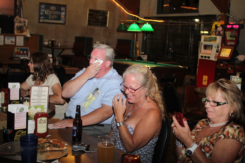 Don Winslow wipes away some tears of laughter while Mariann Anthony & Sally Scott share the laugh