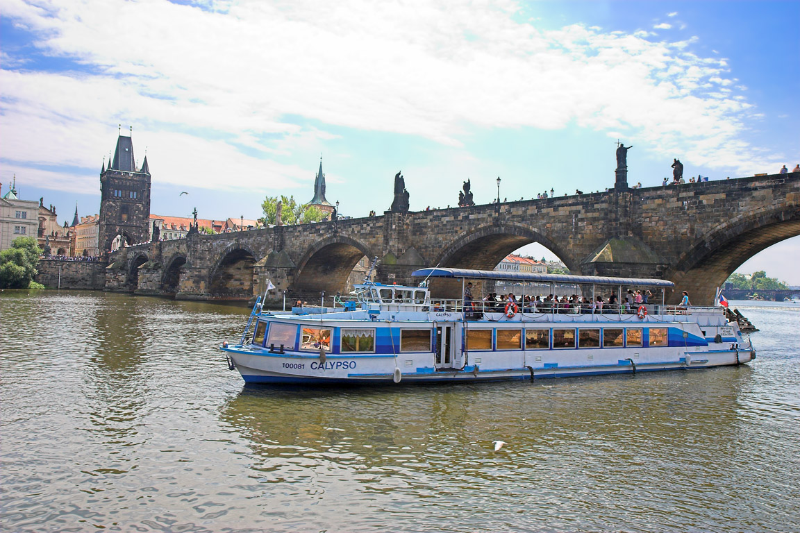Cruise Boat under Charles Bridge