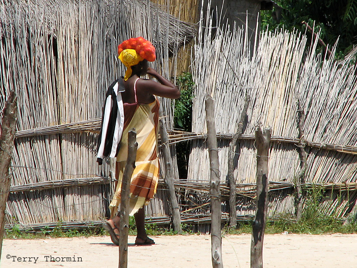 Woman carrying bag of oranges 2a - Etsha Okavango Delta copy.jpg