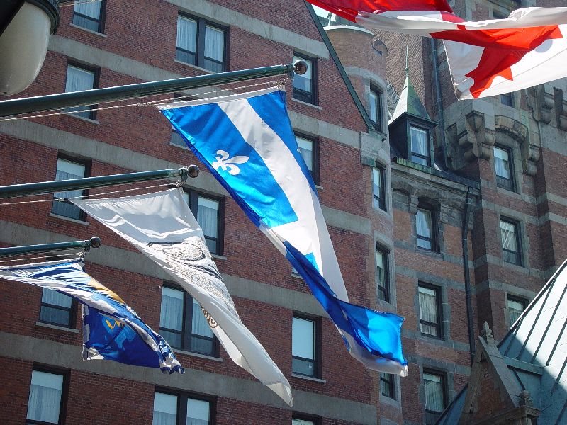 THE FRENCH LOVE THEIR FLAGS -THESE FROM THE SIDE OF HOTEL FRONTENAC