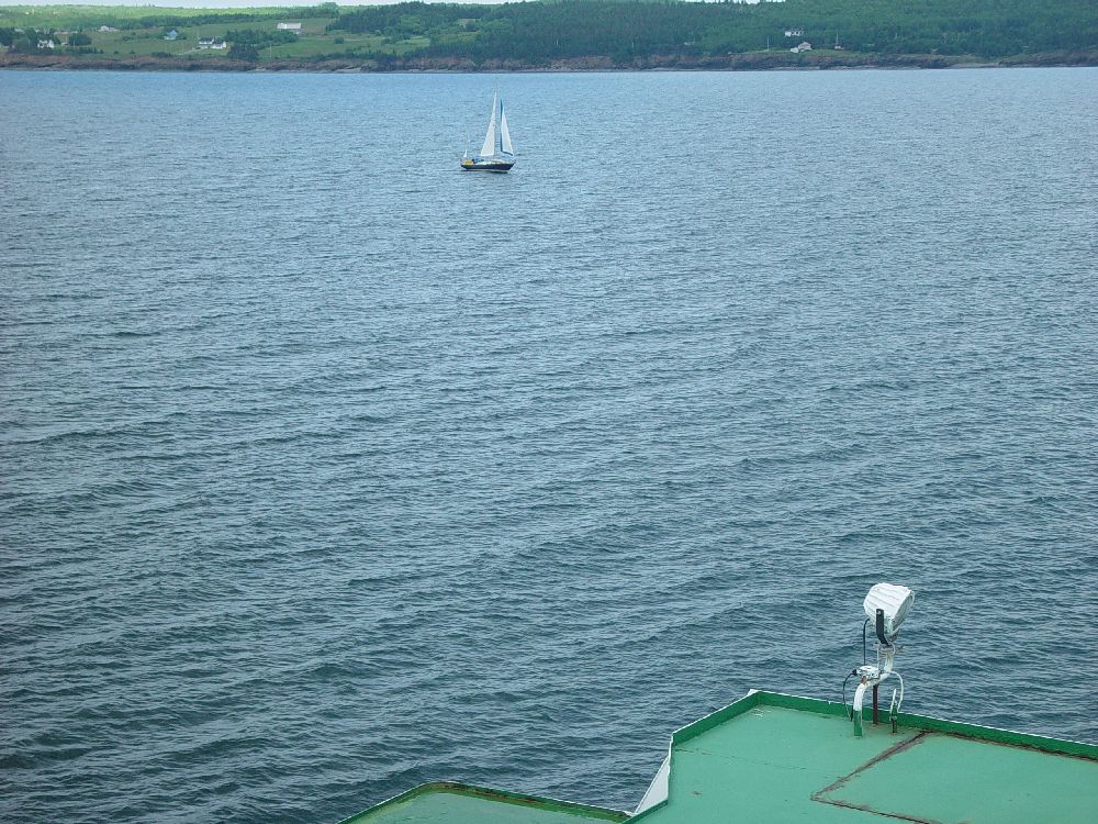 A SMALL SAILBOAT BETTER GET OUT OF OUR WAY