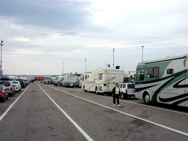 THE LONG LINES AT THE FERRY WAITING TO BOARD