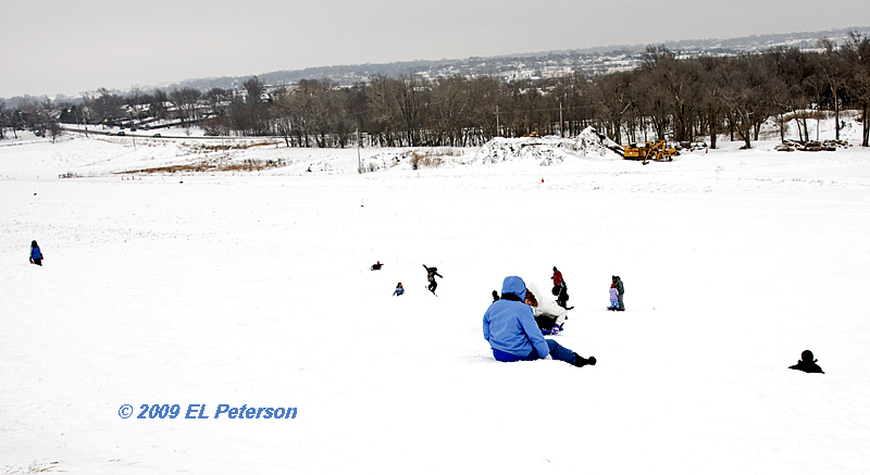 What do you do when you get dug out?  You find a hill (or dam), get some warm clothes and your sled.