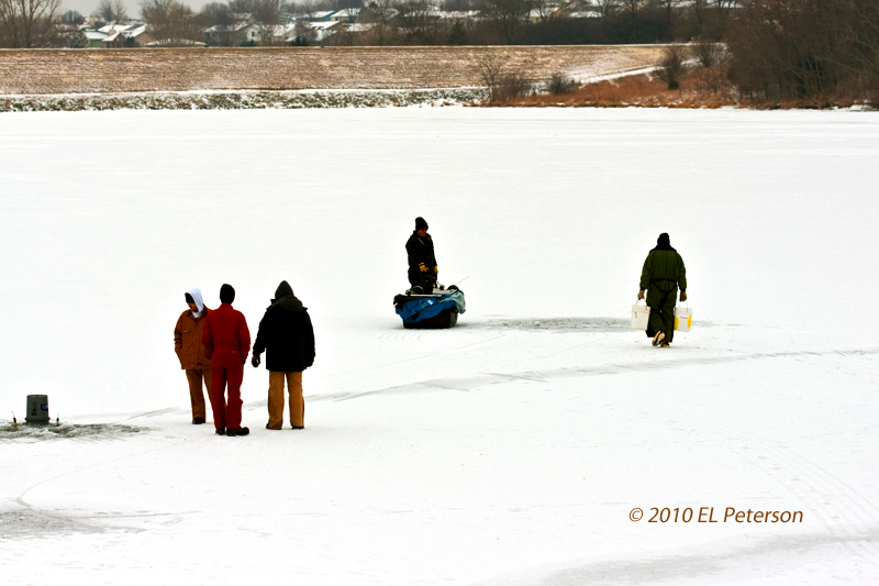 The thril of ice fishing .... will they fall in?