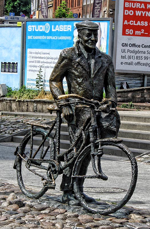 A monument of a man with bicycle called - Stary Marych