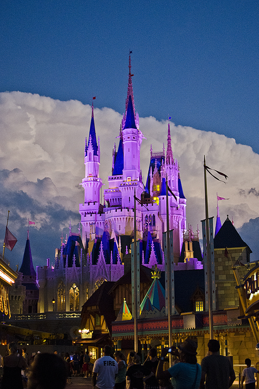 A beautiful night at the magic kingdom, despite the huge lightning cloud just south of the park