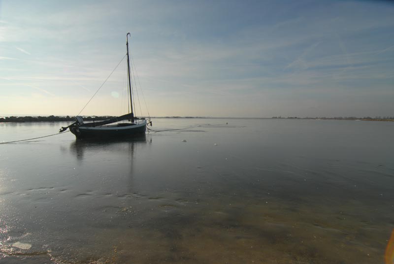  Frozen Lake and boat.