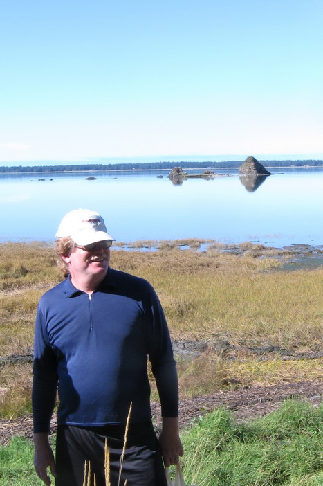 Tom grins; Pinnacle Rocks in the background.