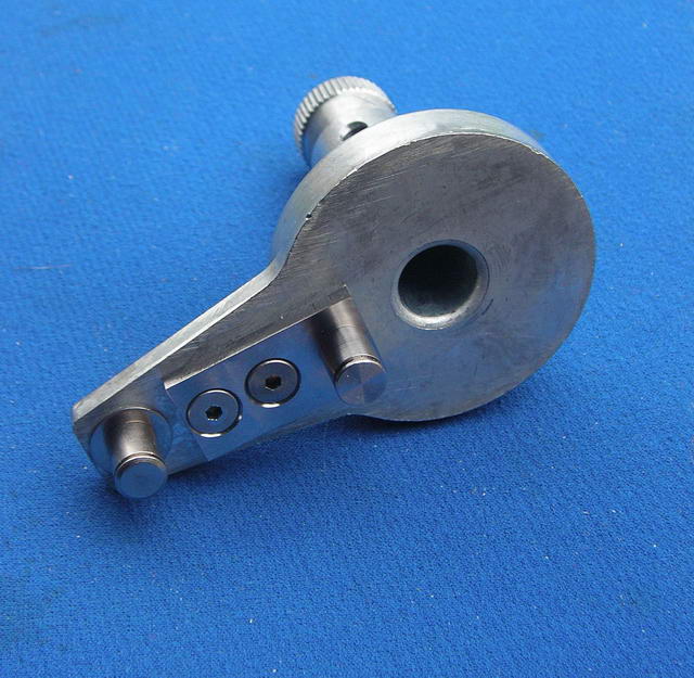 Throttle arm inside single lever control; added pin did not work well