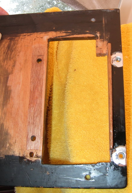 Underside of existing helm plate; new 10-24 tee nuts to right (port side).